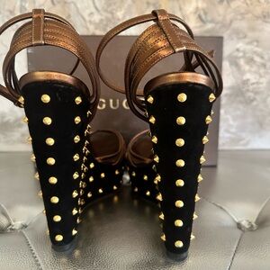 Beautiful Gucci wedge shoe. Black suede and bronze leather with gold studs.